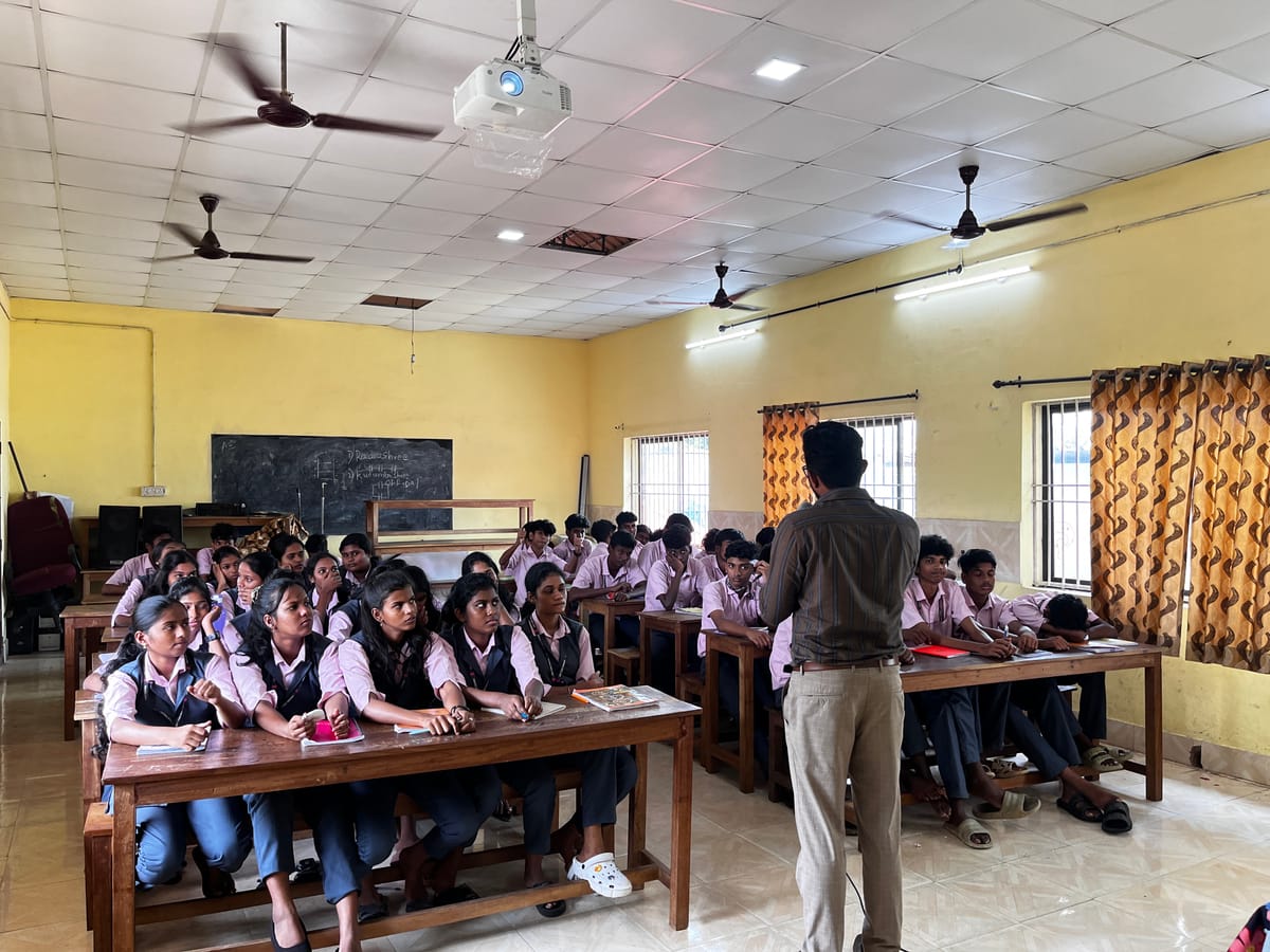 An NPoC session with a hall full of students