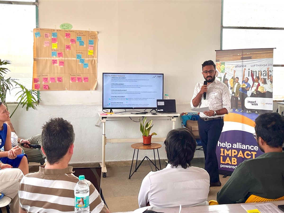 Javed Hussain presenting at the Impact Lab