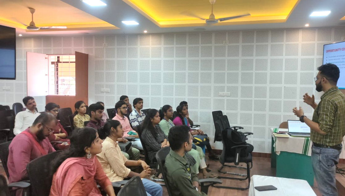 A facilitator leads a DISHA session in a college seminar hall