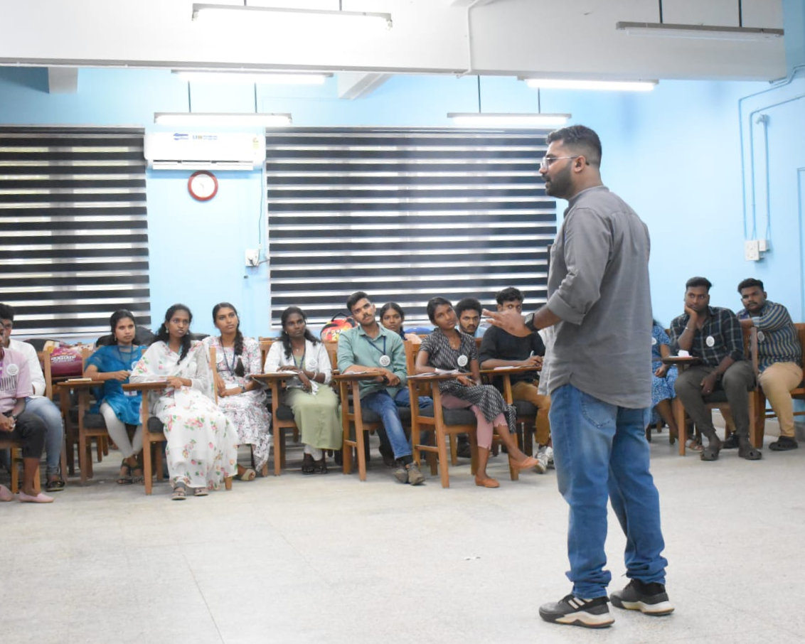 An NPoC trainer speaks to a room of THRIVE volunteers