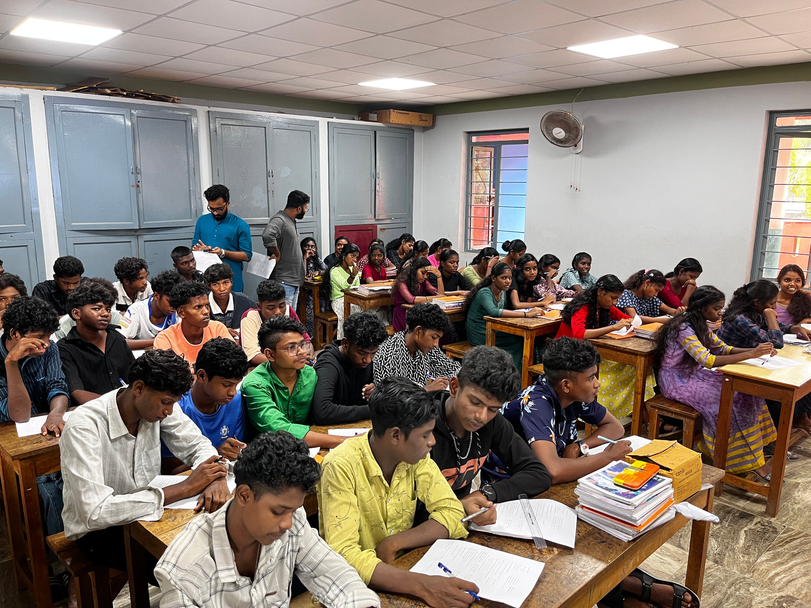 Students filling in the survey in their classroom